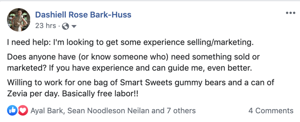 Facebook post reads: I need help: I'm looking to get some experience selling/marketing.  Does anyone have (or know someone who) need something sold or marketed? If you have experience and can guide me, even better.  Willing to work for one bag of Smart Sweets gummy bears and a can of Zevia per day. Basically free labor!!