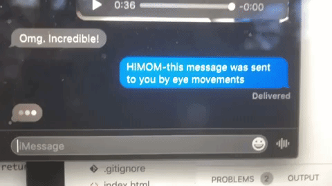 GIF of text message sent using only eye movements. It says "HI MOM."
