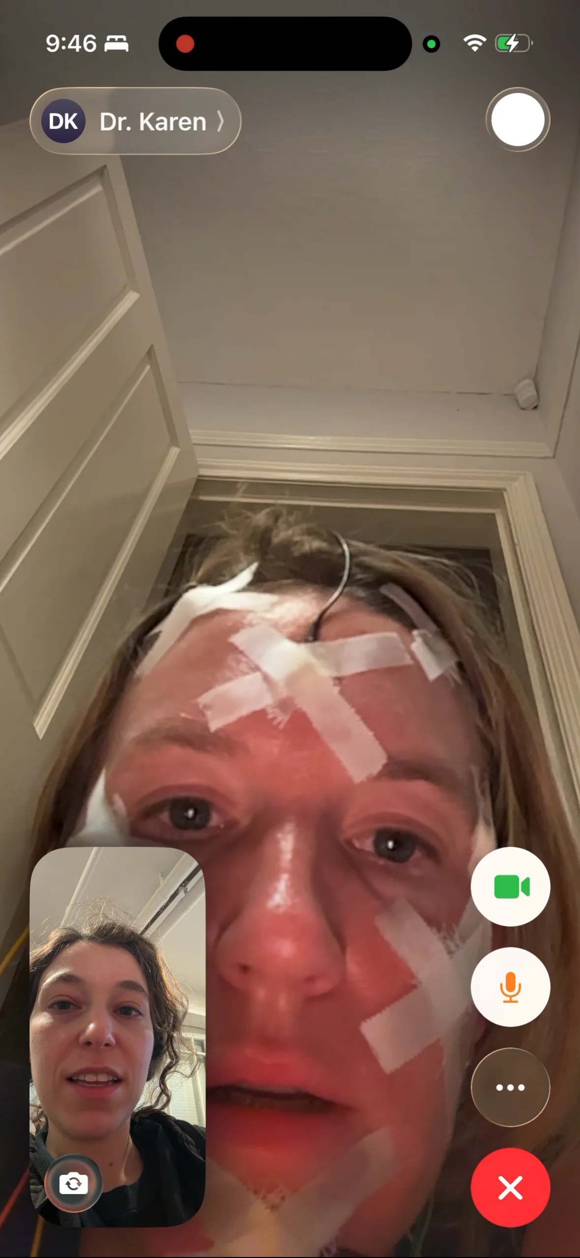 FaceTime call with Dr. Karen Konkoly wearing taped-on sleep-monitoring electrodes while Dashiell appears in the inset.